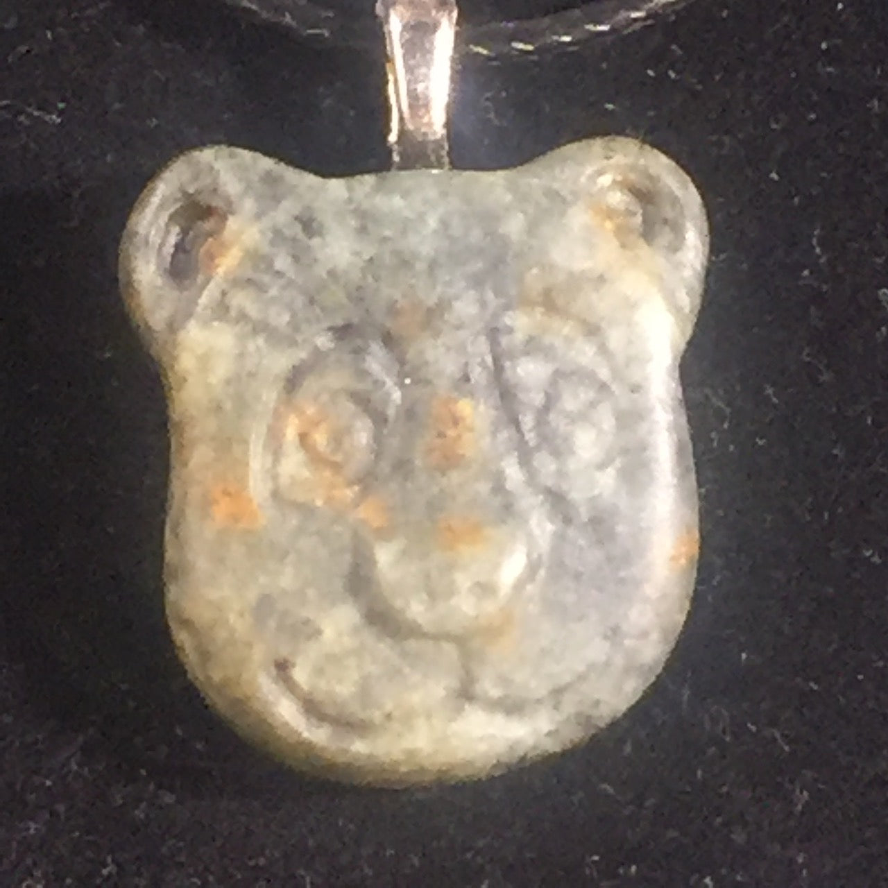 Fun for families, this Canadian soapstone bear head pendant was made at Fathom Stone Art at the Westin Whistler.