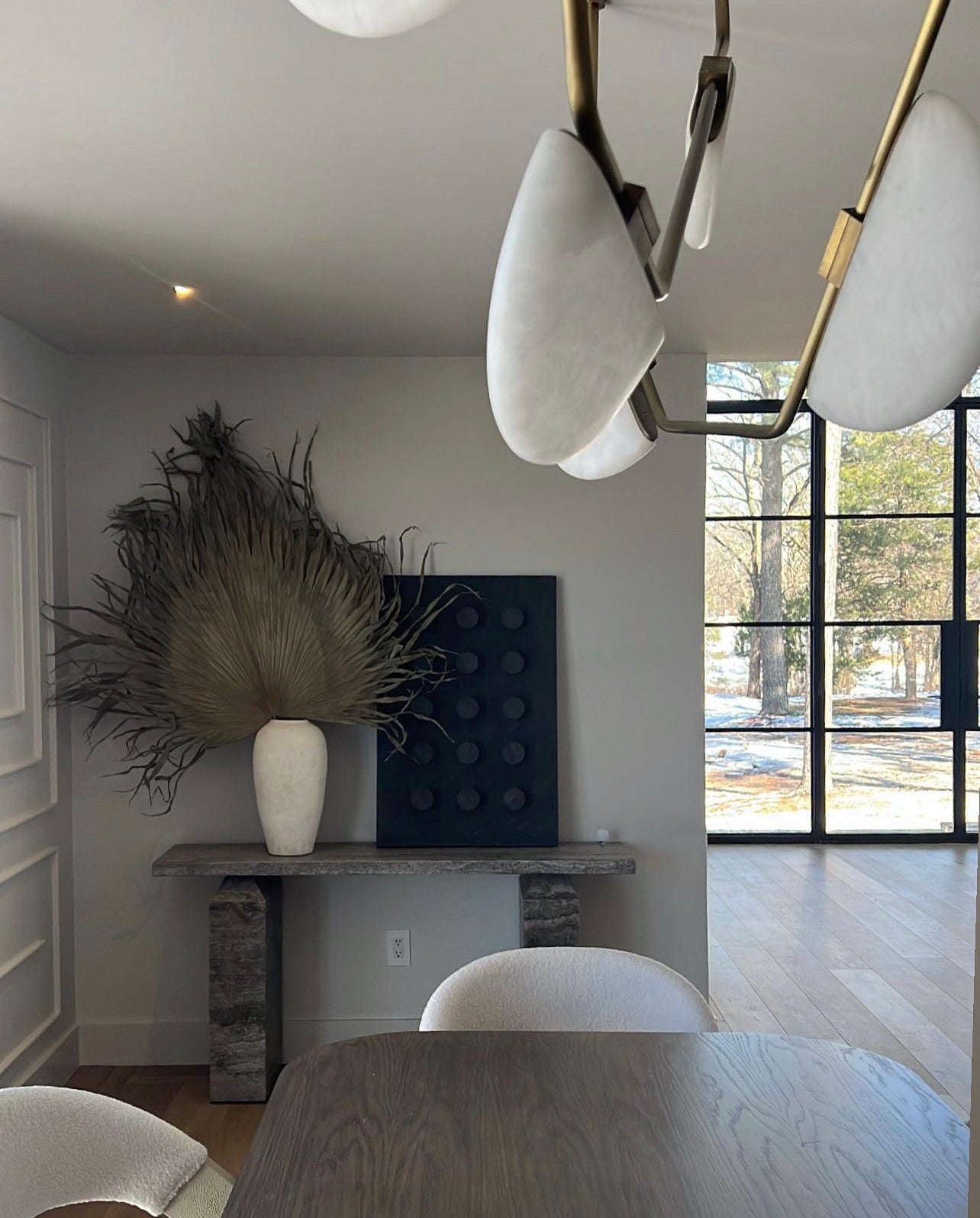 The uniqueness of angles on these alabaster lights makes the half moon alabaster lights works of art.