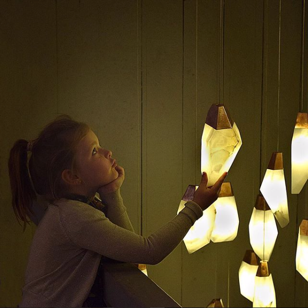 The curiosity the glow of these alabaster stone pendant lights bring people hand to the stone. Randy Zieber lights are hand made in Vancouver.