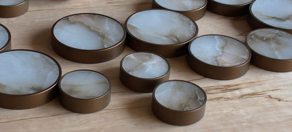 This bronze color light matches the natural veining in these alabaster lights. Randy Zieber lights at Fathom Stone Art are handmade in Vancouver, BC.