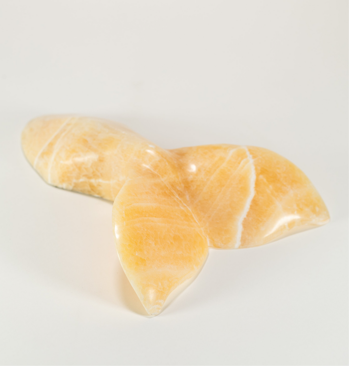 Orca Tail - Golden Onyx – Golden Onyx wildlife sculpture