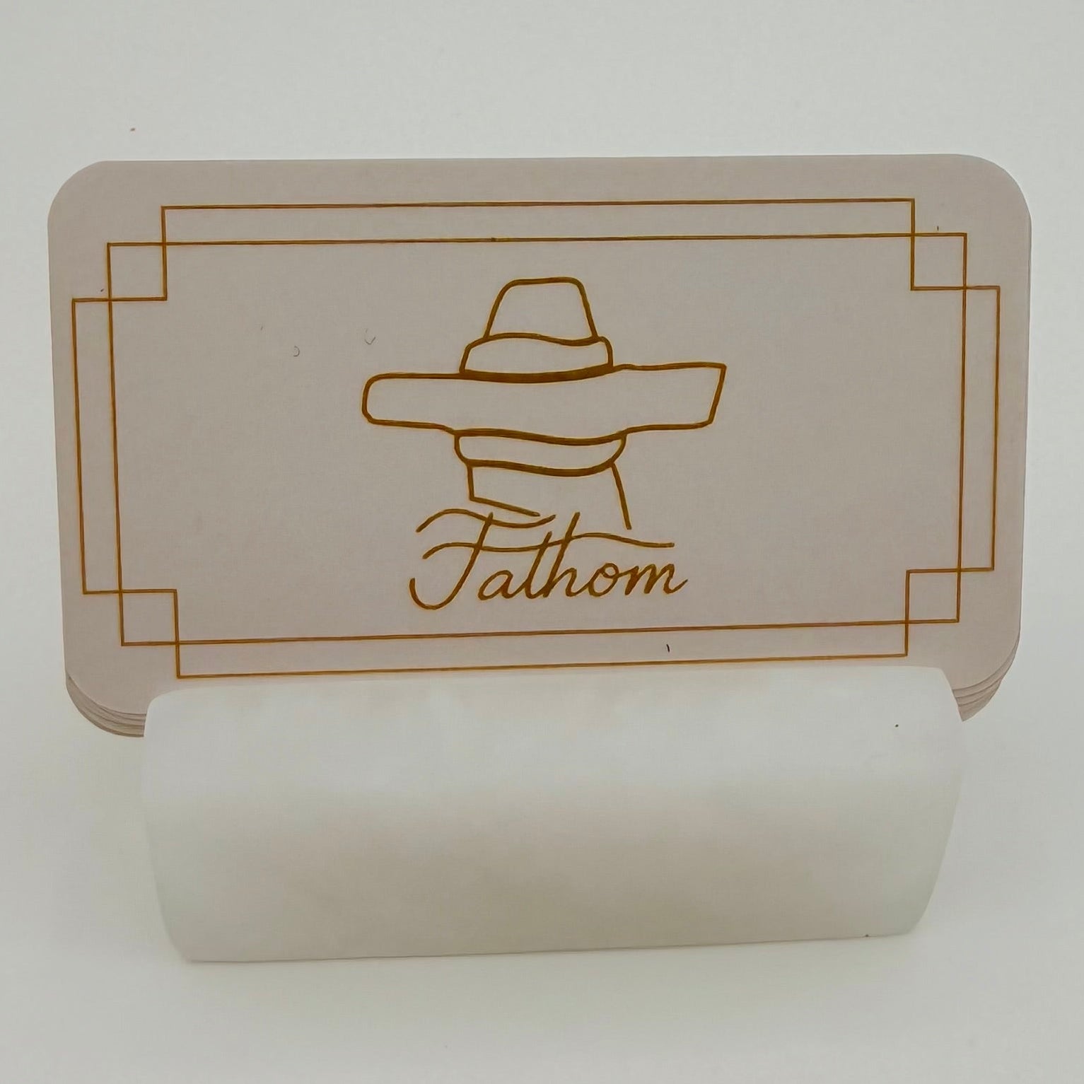 Card with a logo and text 'Fathom' on a white background