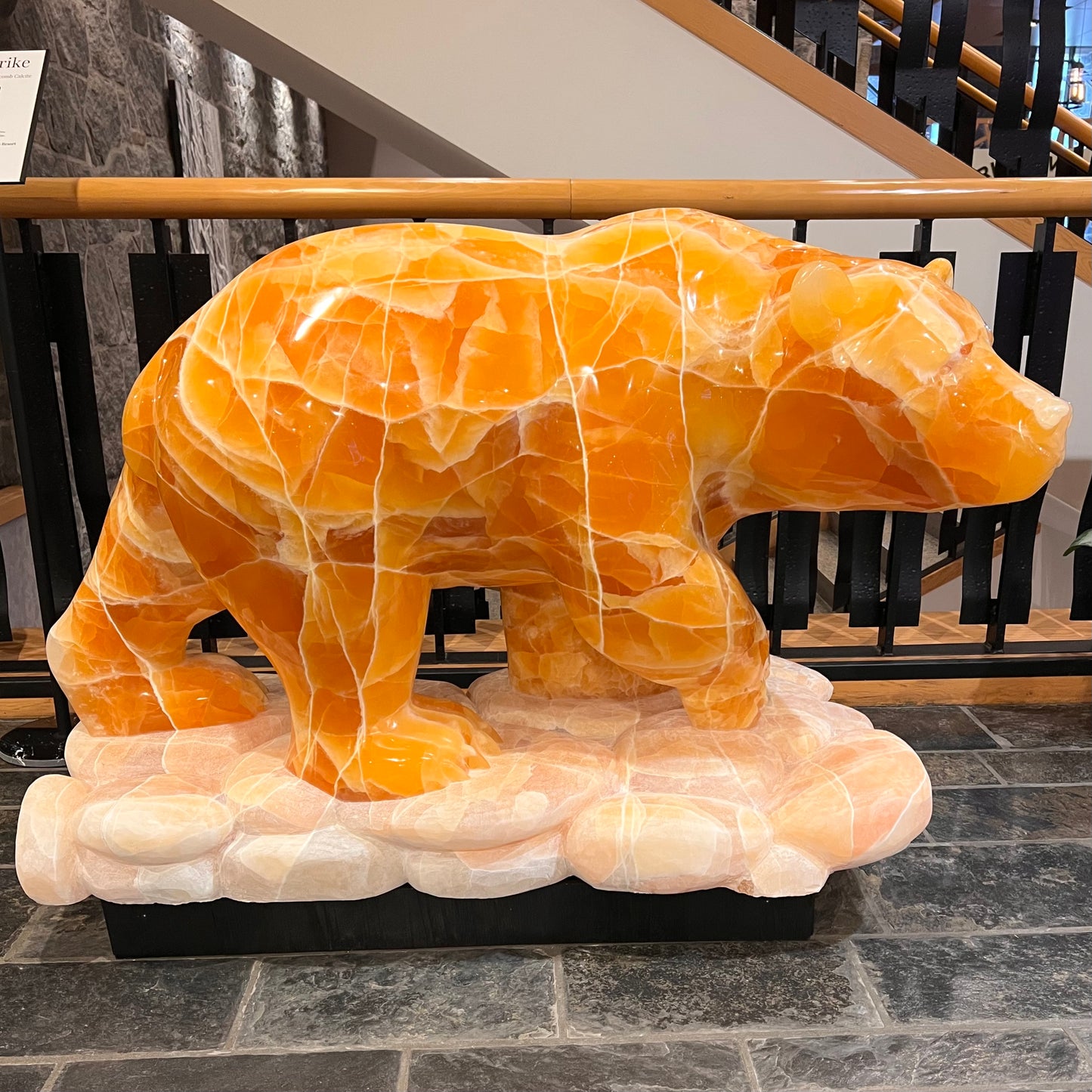 Gold Strike — Honeycomb Calcite Grizzly Walking On River Stone