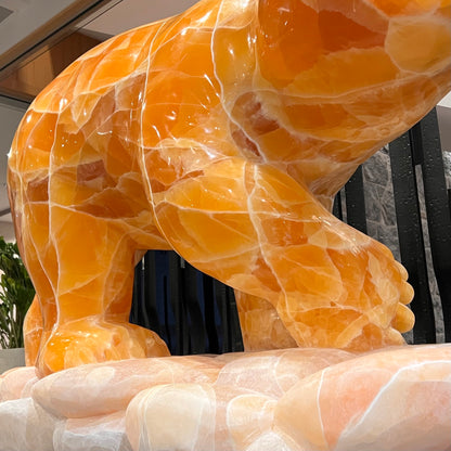 Gold Strike — Honeycomb Calcite Grizzly Walking On River Stone