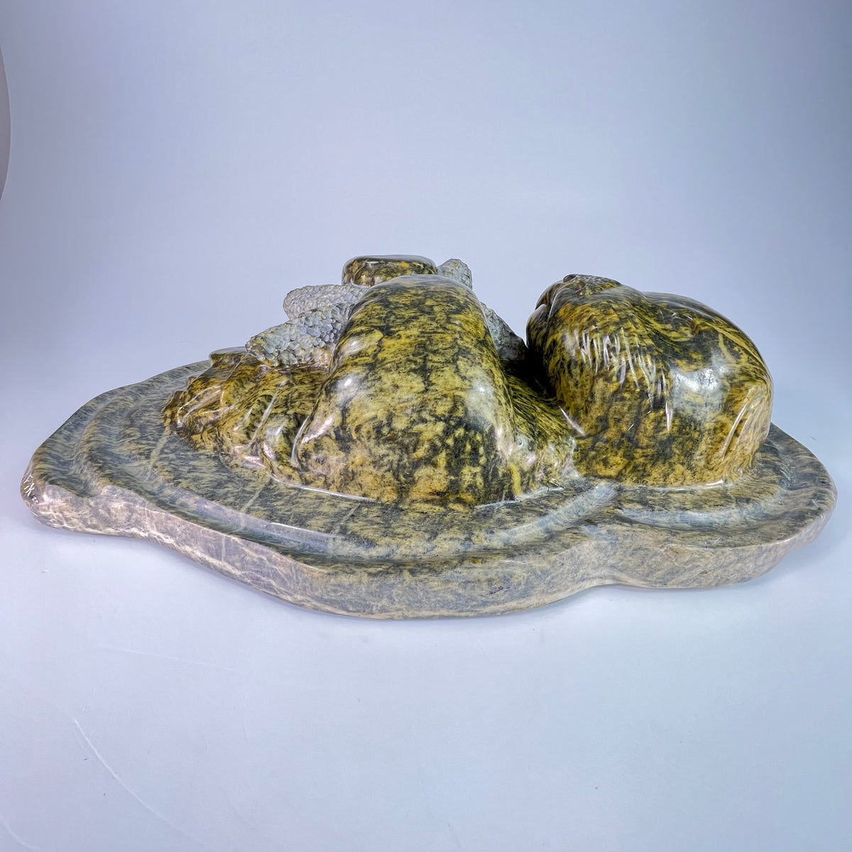 Floating Feast – BC Gold & Green Soapstone wildlife sculpture