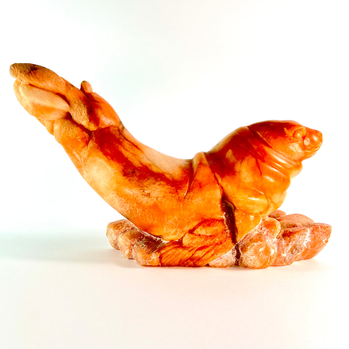 Sunrise Seal – Orange Alabaster wildlife sculpture