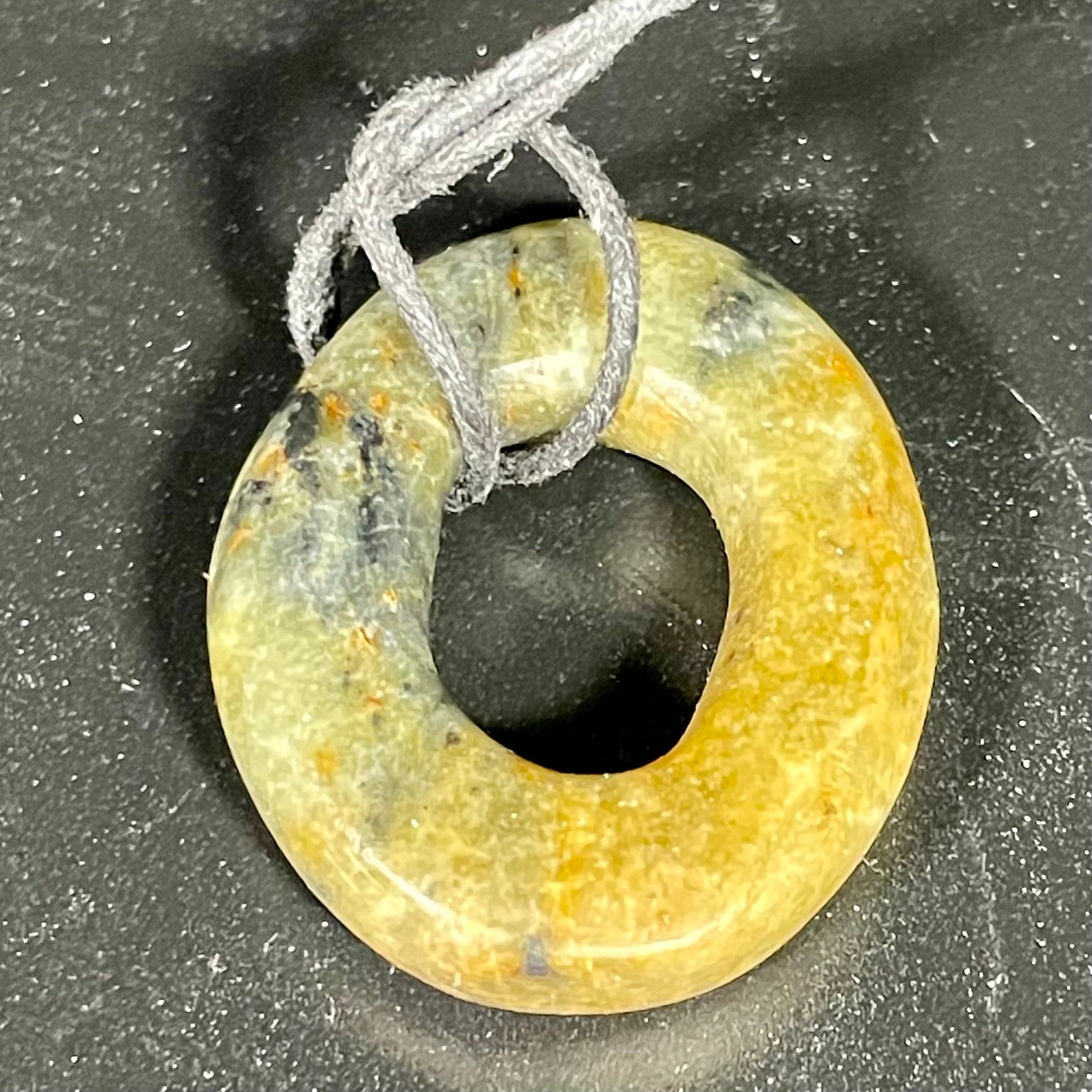 Unique circle pendant made at Fathom Stone Art classes, Whistler BC rainy day activity