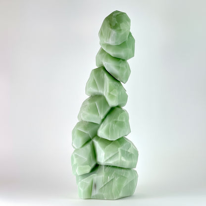 Discover the serene beauty of British Columbia's winter landscape captured in hand-carved stone. This striking Emerald Snow Tree sculpture showcases intricate detail work, with delicate snow-laden branches emerging from rich emerald tones. This piece is uniquely carved, making it a one-of-a-kind artistic treasure. Perfect for nature lovers and art collectors seeking authentic Canadian craftsmanship, this sculptural work brings the tranquility of snowy forests into your home or gallery space. A timeless inv
