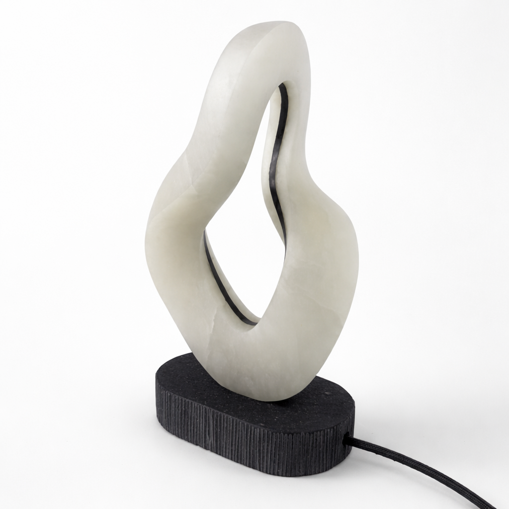 One-of-a-kind abstract alabaster lamp showcasing natural stone veining and soft ambient glow.