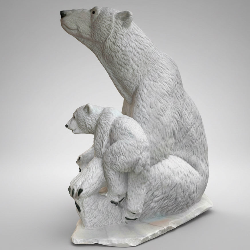 Statue of a polar bear with two cubs on a white background