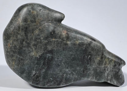 A FathomStoneArt stone sculpture of a bird.