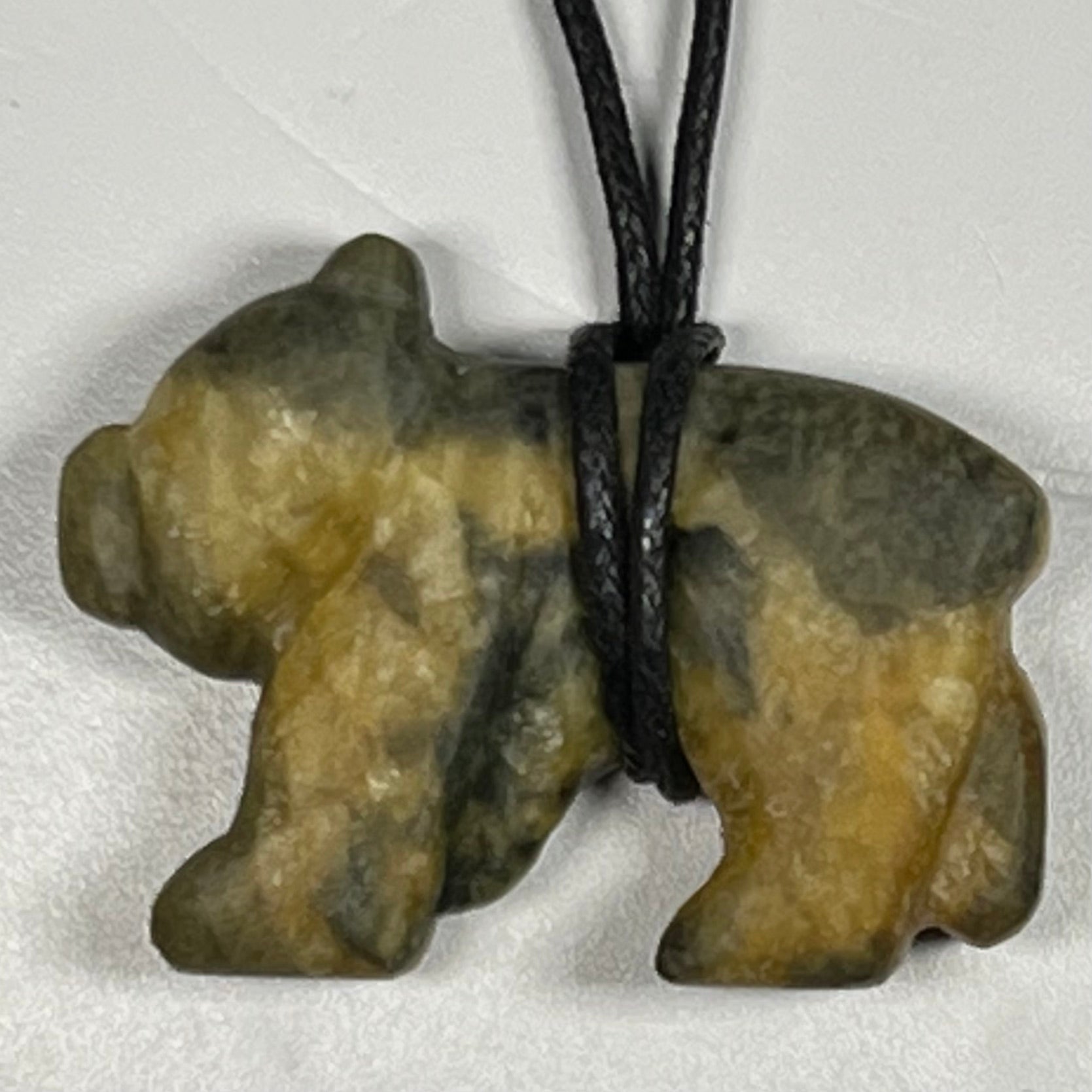 Bear Pendant carved at Fathom Stone Art Class in the Westin Resort Whistler, BC