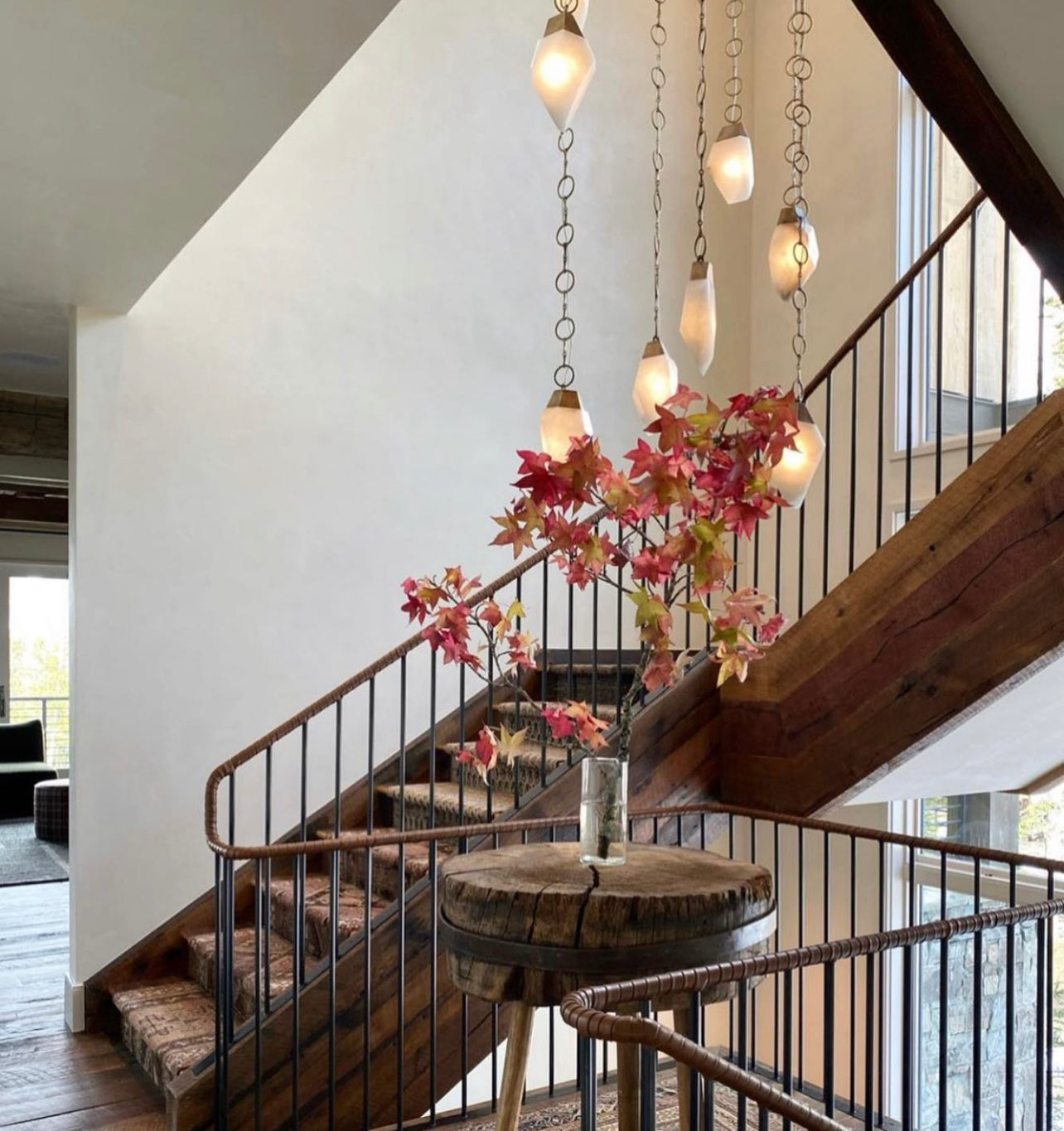 This Amber Design staircase is one of the top interior designs that have incorporated our Rand Zieber natural alabaster stone lighting into the space.