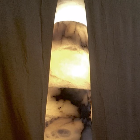 This multi stone alabaster rocket light looks like it might launch to Mars from SpaceX headquarters. 