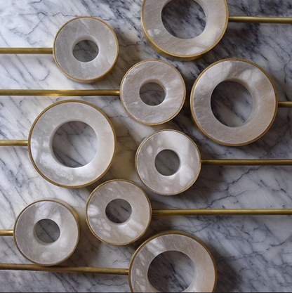 Designer lighting is trending with natural alabaster stone.  The craftsmanship and skill needed to carve these lights is a high level of stone carving.  The veining and patterns in alabaster make each light one of a kind.