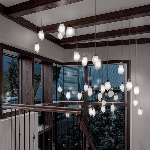 This Whistler BC house chose these Fathom Stone Art alabaster lights for throughout the lake house.