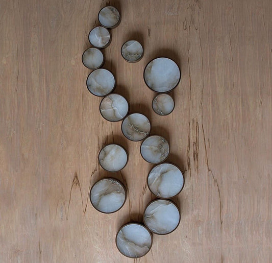 These beautiful alabaster circle lights can be placed in any pattern desired on the ceiling or wall.  Designers have ordered constellation patterns for these lights like Taurus, Virgo, and Caprico.