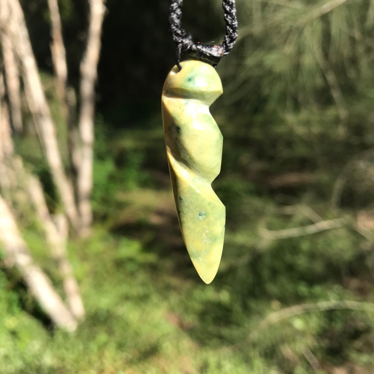 Carved freeform pendant (New Zealand flower jade)