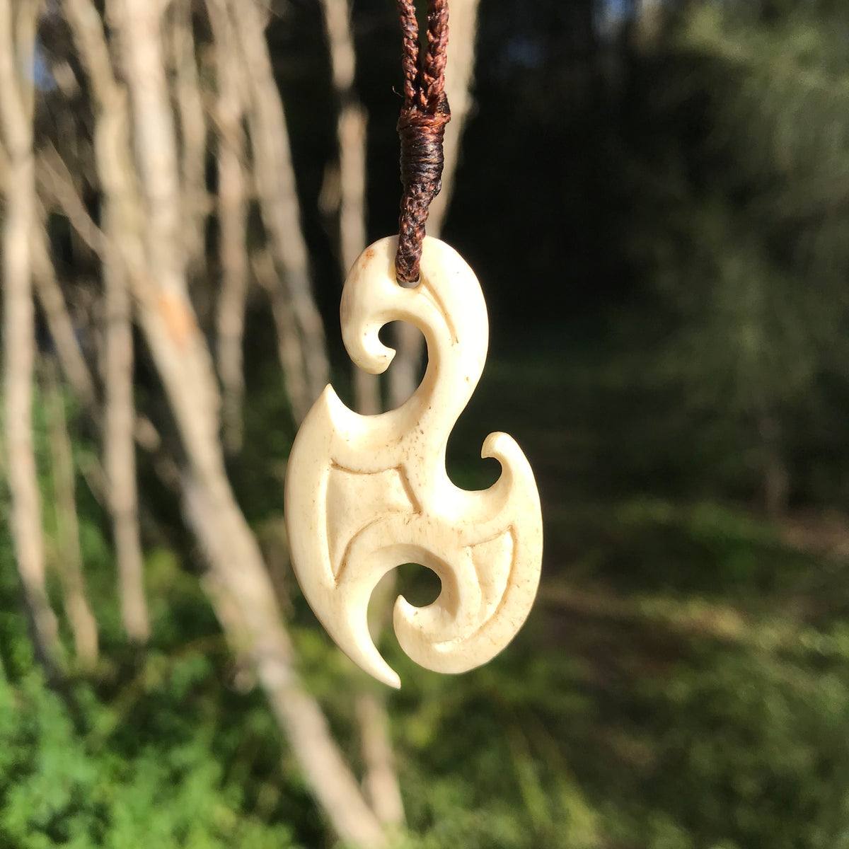 Fish hook trio (bone) – stone sculpture