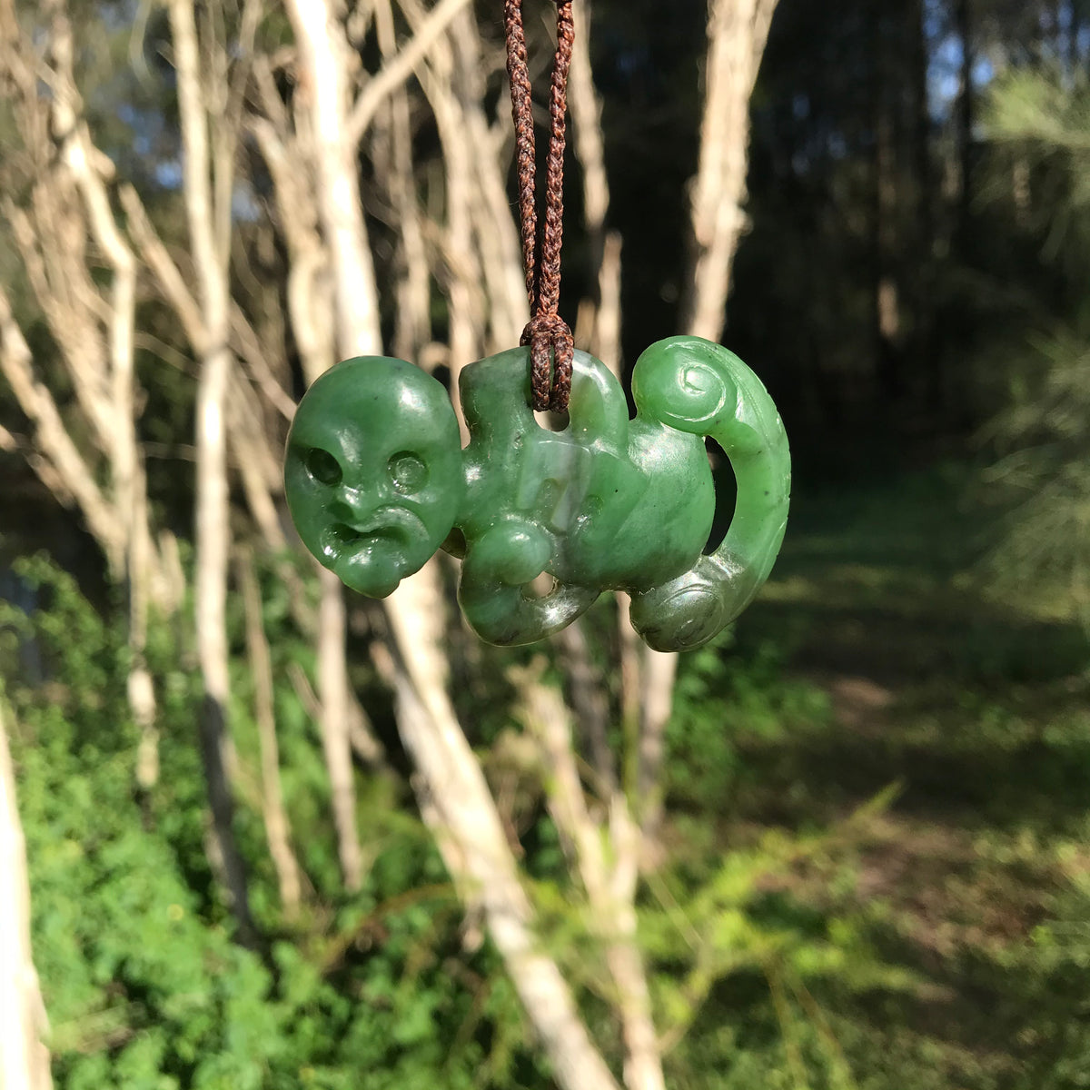 Hei Tiki (Canadian jade) – stone sculpture