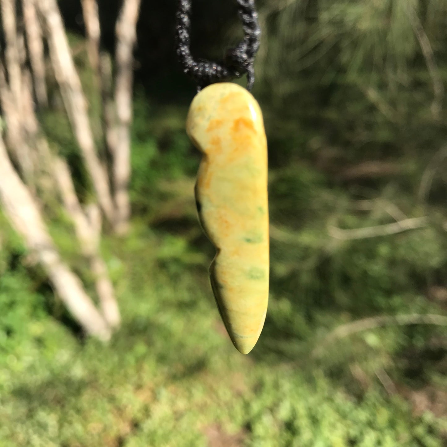 Carved freeform pendant (New Zealand flower jade)